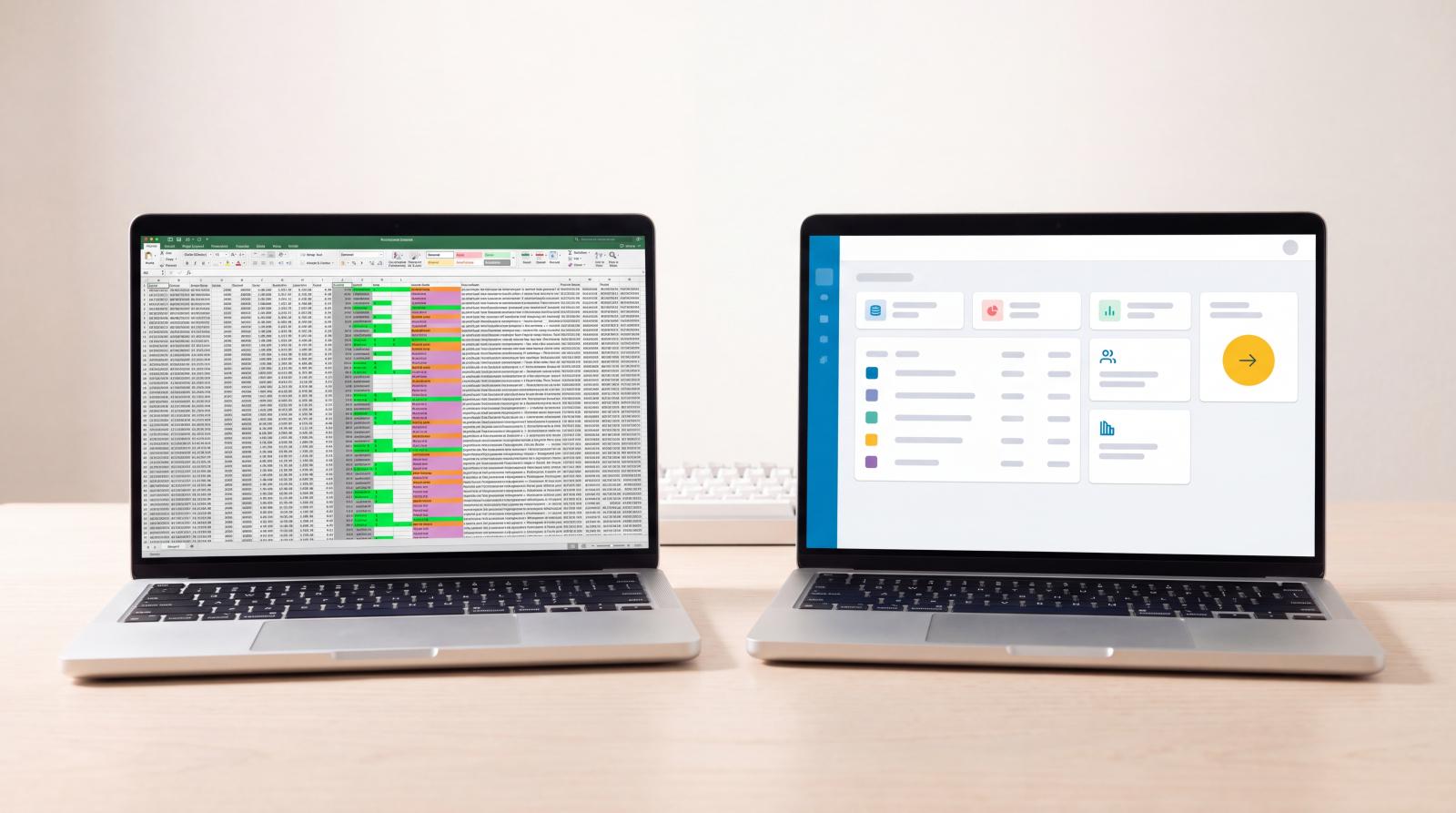 Two laptops displaying spreadsheet and business dashboard applications side by side